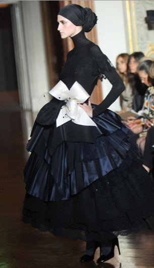 Illustration for article titled Christian Lacroix Couture Show A Blitz Of Somber Creativity For Dark Times